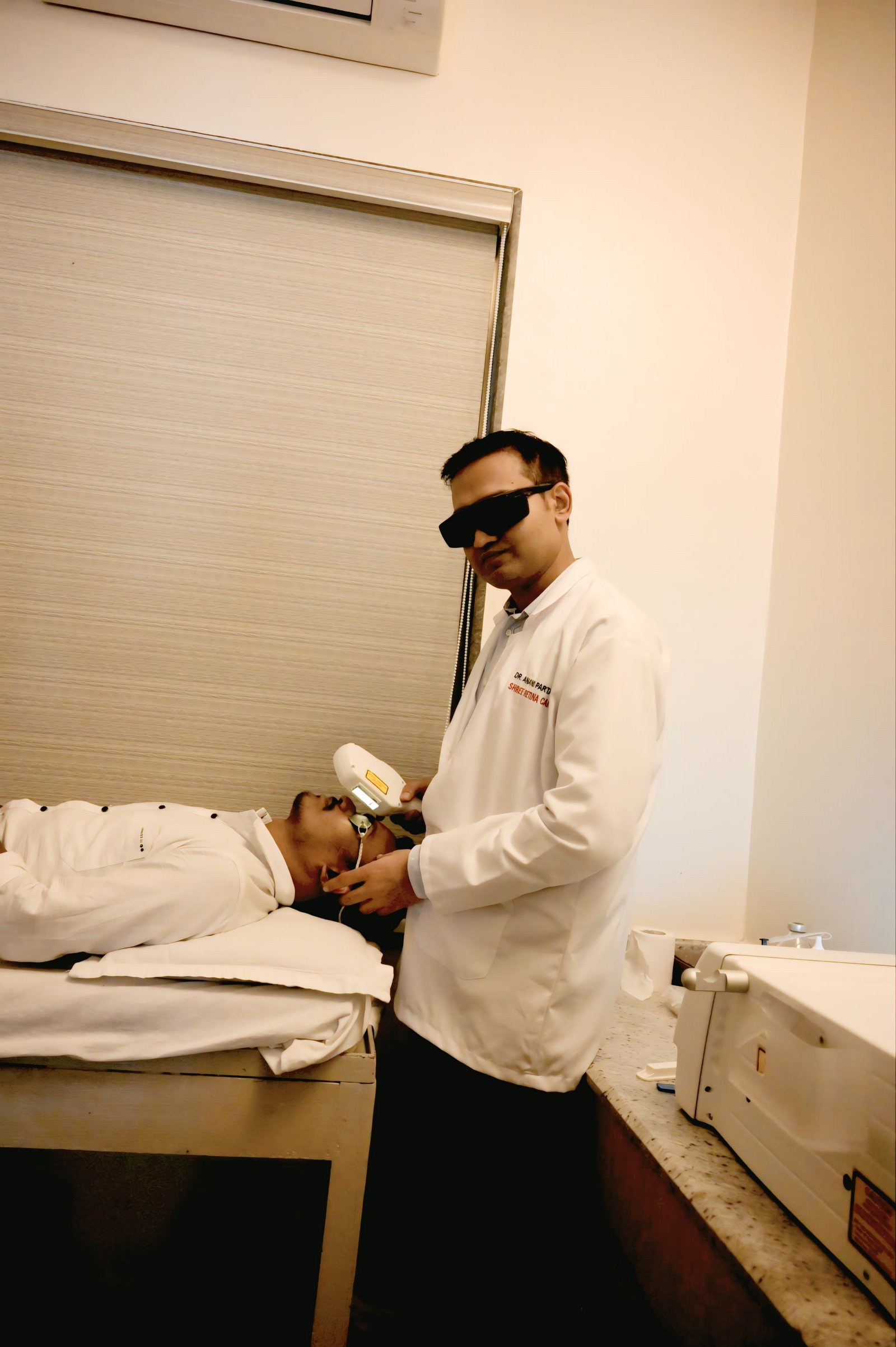 Doctor performing a laser eye procedure